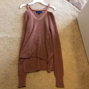 A pink-ish long sleeve shirt.